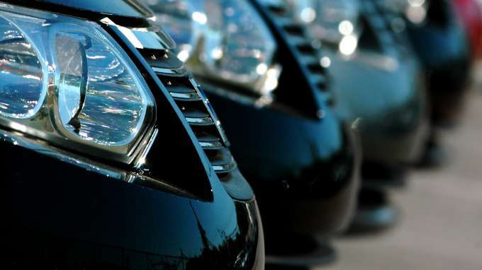 Row of New Cars A car invoice price is the price the dealer pays the 